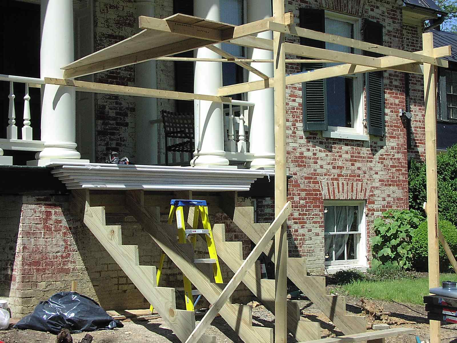 Layout templates suspended over site of staircase.