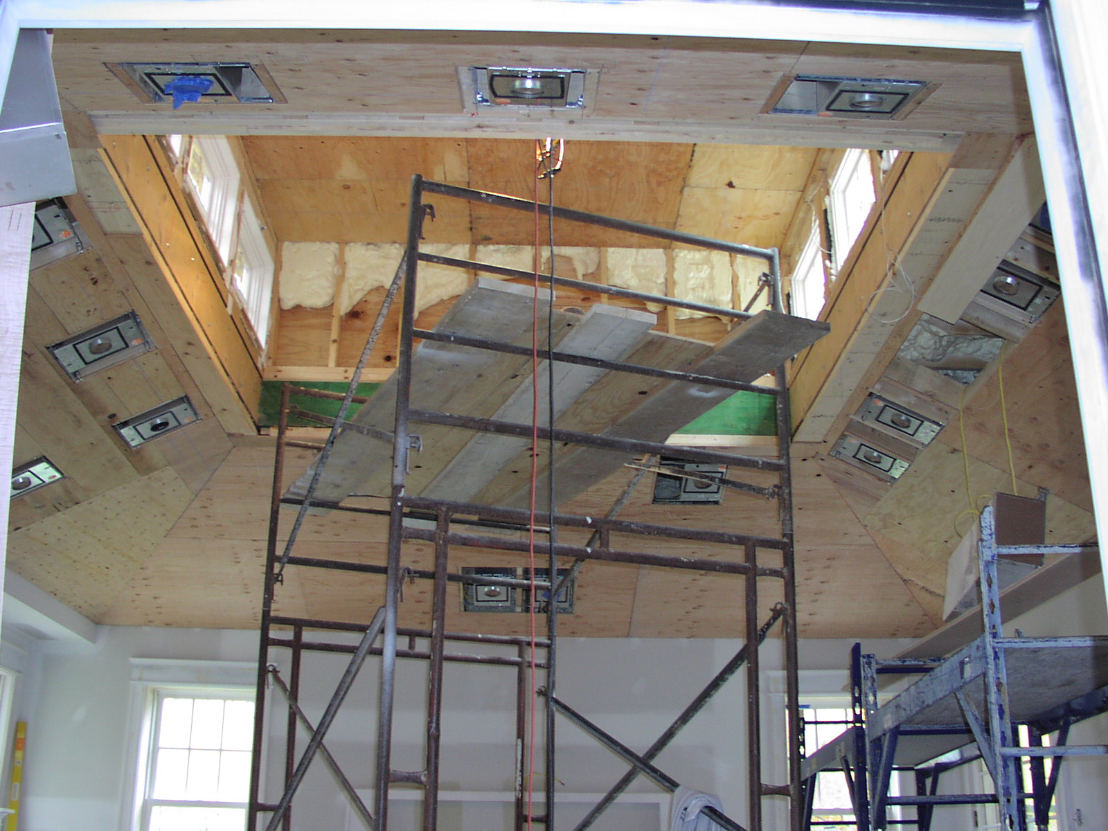 Scaffolding fills cupola during installation.